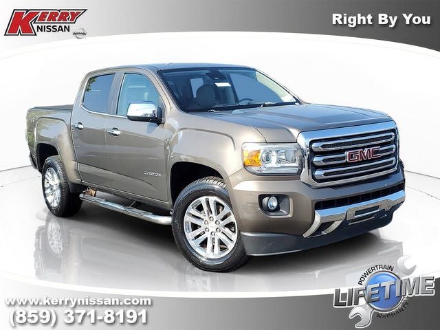 2016 GMC Canyon SLT in Bronze Alloy Metallic — front three-quarter view
