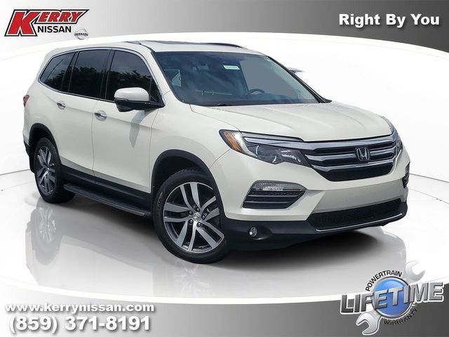 2018 Honda Pilot Touring in White Diamond Pearl — front three-quarter view