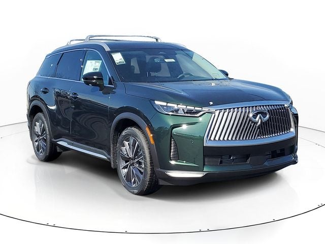 2026 INFINITI QX60 LUXE in Deep Emerald — front three-quarter view
